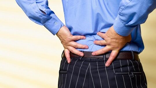 Comharthaí agus léirithe osteochondrosis lumbar